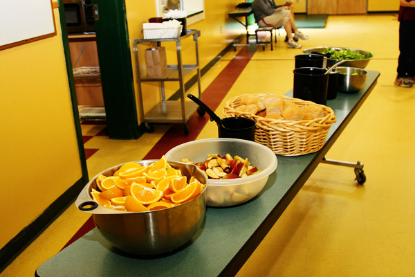 food in nice bowls on cafeteria table