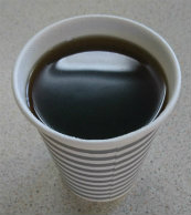 disposable coffee cup on countertop