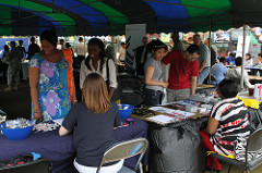 people at a table at a job fair